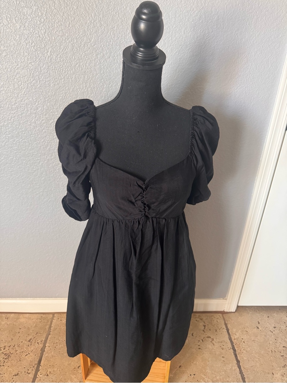 Black Puff Sleeve Mini Dress with Ruched Bodice.  Pockets